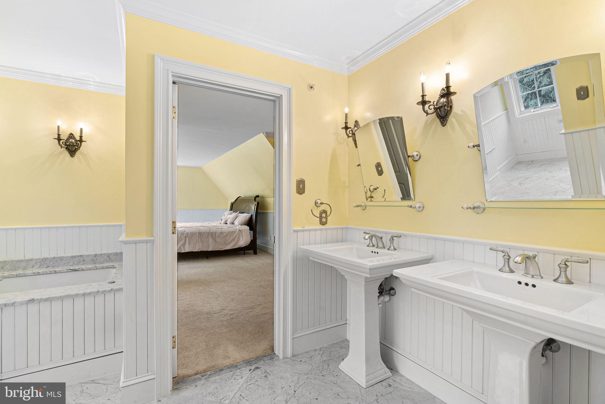 2 Greystone Circle Newtown Square, PA 19073 - Photo 30 of 57 a en suite bathroom with a sink and a mirror