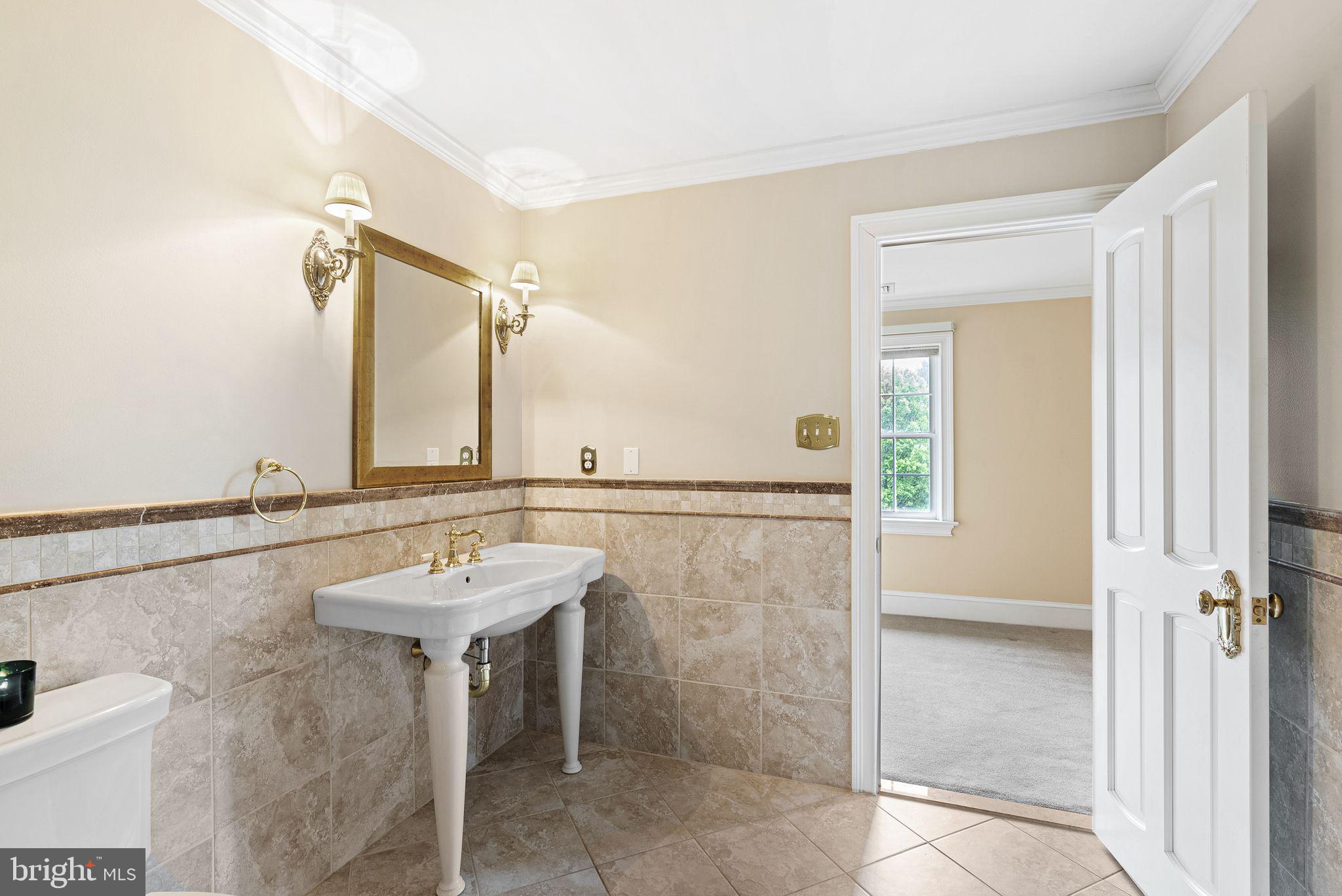 2 Greystone Circle Newtown Square, PA 19073 - Photo 33 of 57 a bathroom with a sink and a mirror