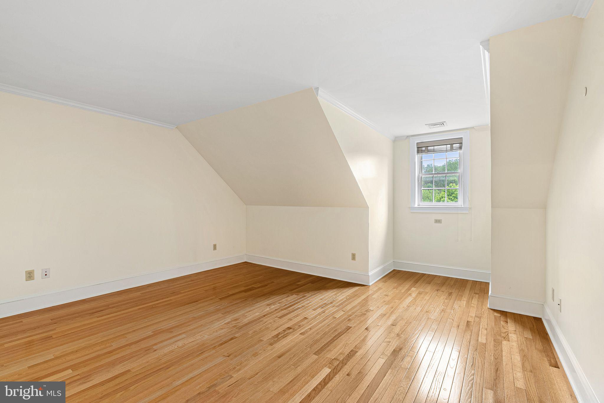 2 Greystone Circle Newtown Square, PA 19073 - Photo 38 of 57 an empty room with wooden floor and windows