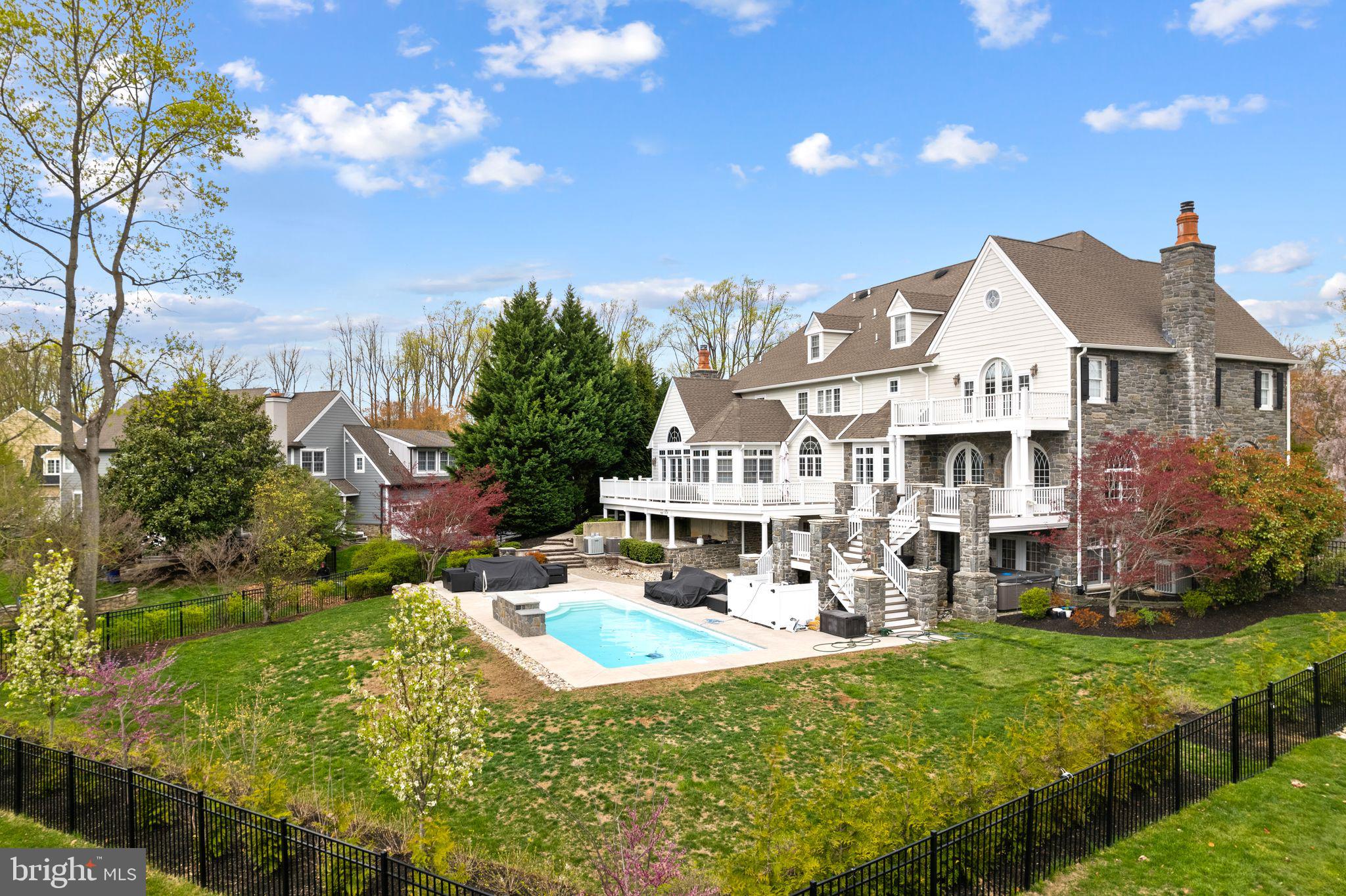 2 Greystone Circle Newtown Square, PA 19073 - Photo 50 of 57 a aerial view of a house with swimming pool and garden
