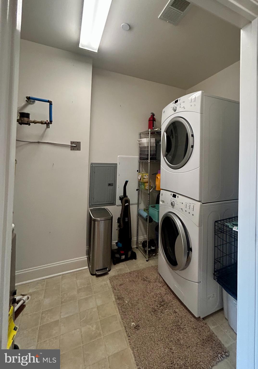 2346 Highway 33, Unit 302 Robbinsville, NJ 08691 - Photo 18 of 21 a utility room with dryer and washer