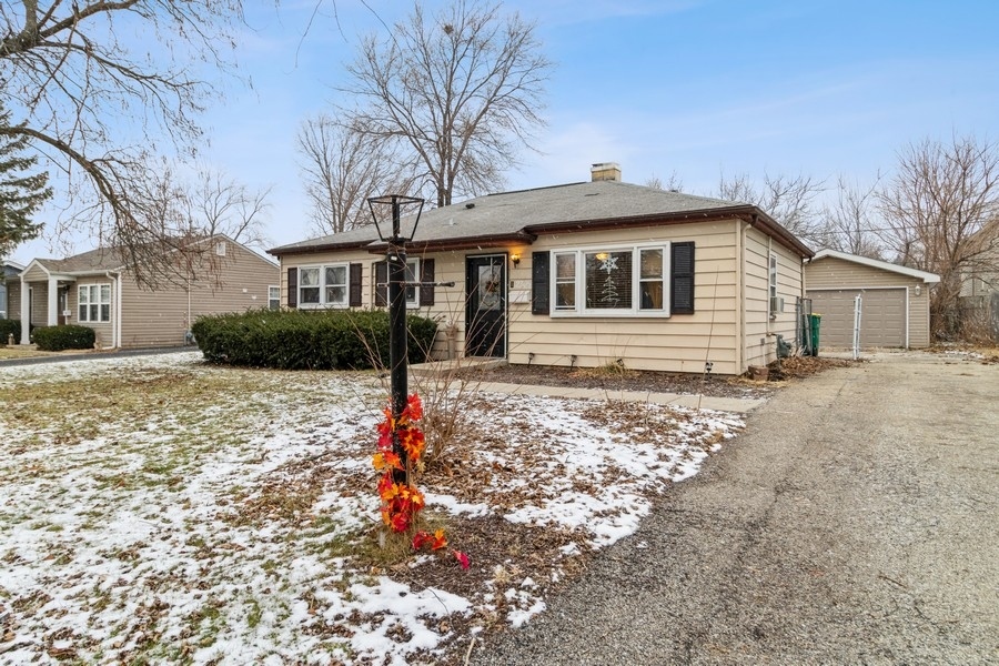 2305 Marmion Avenue Joliet, IL 60436 - Photo 2 of 10 a front view of a house with a yard