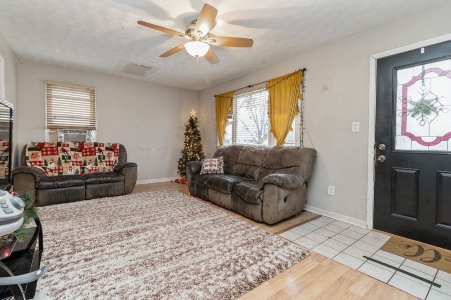 2305 Marmion Avenue Joliet, IL 60436 - Photo 4 of 10 a living room with furniture and a window
