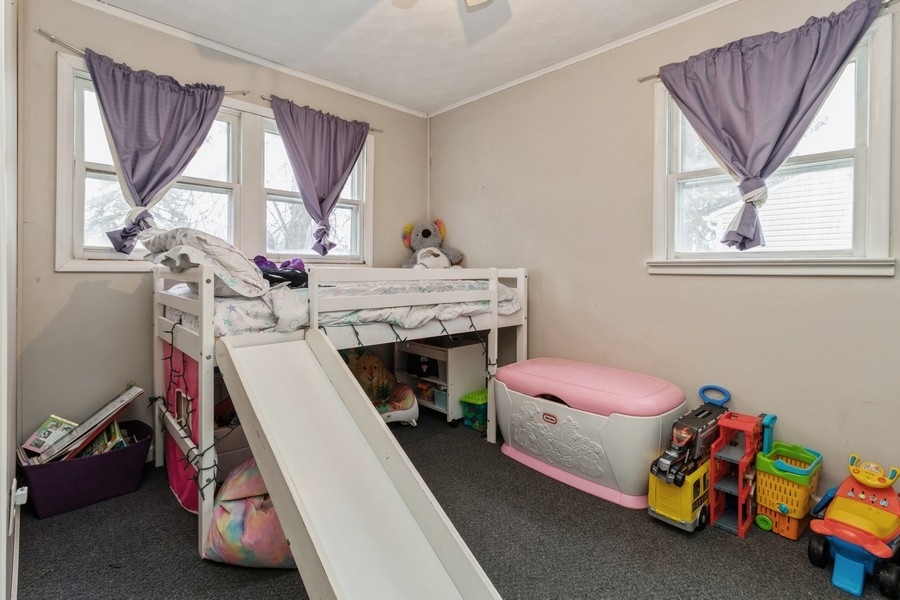 2305 Marmion Avenue Joliet, IL 60436 - Photo 7 of 10 a room with a bed and a window