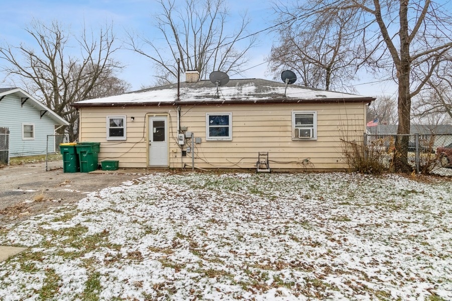 2305 Marmion Avenue Joliet, IL 60436 - Photo 10 of 10 a house that has a tree in front of the house