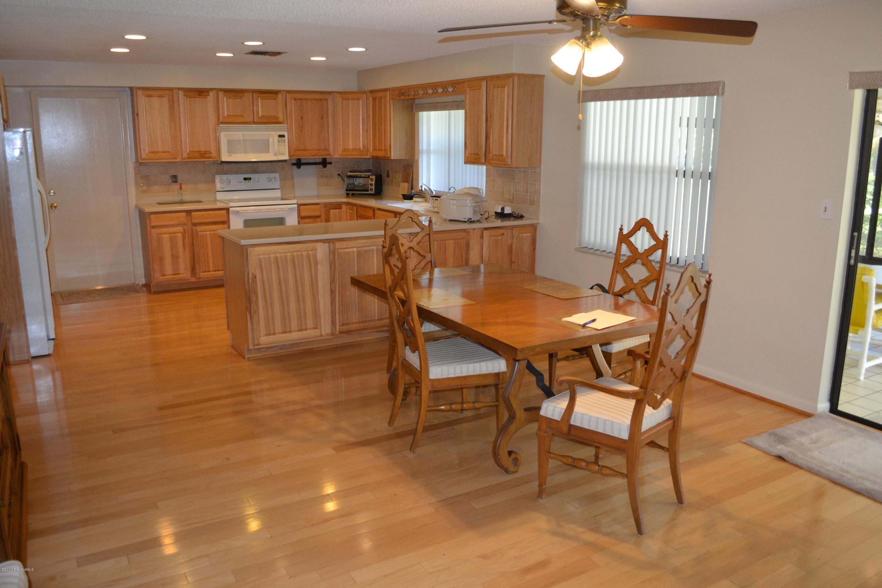 500 Plantation Road Merritt Island, FL 32952 - Photo 8 of 35 Dining Room leading to the kitchen