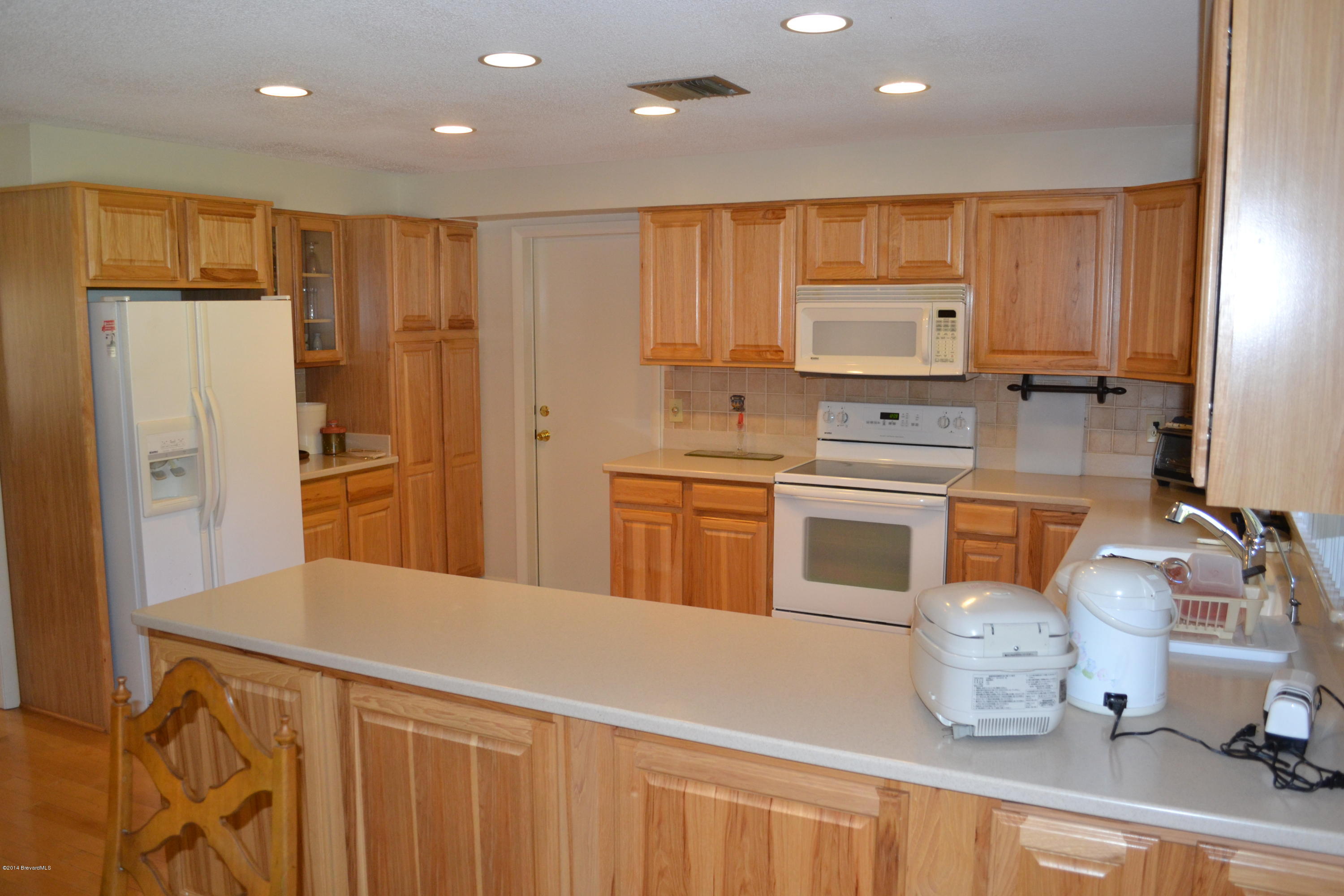 500 Plantation Road Merritt Island, FL 32952 - Photo 10 of 35 Kitchen w/lots of cabinets