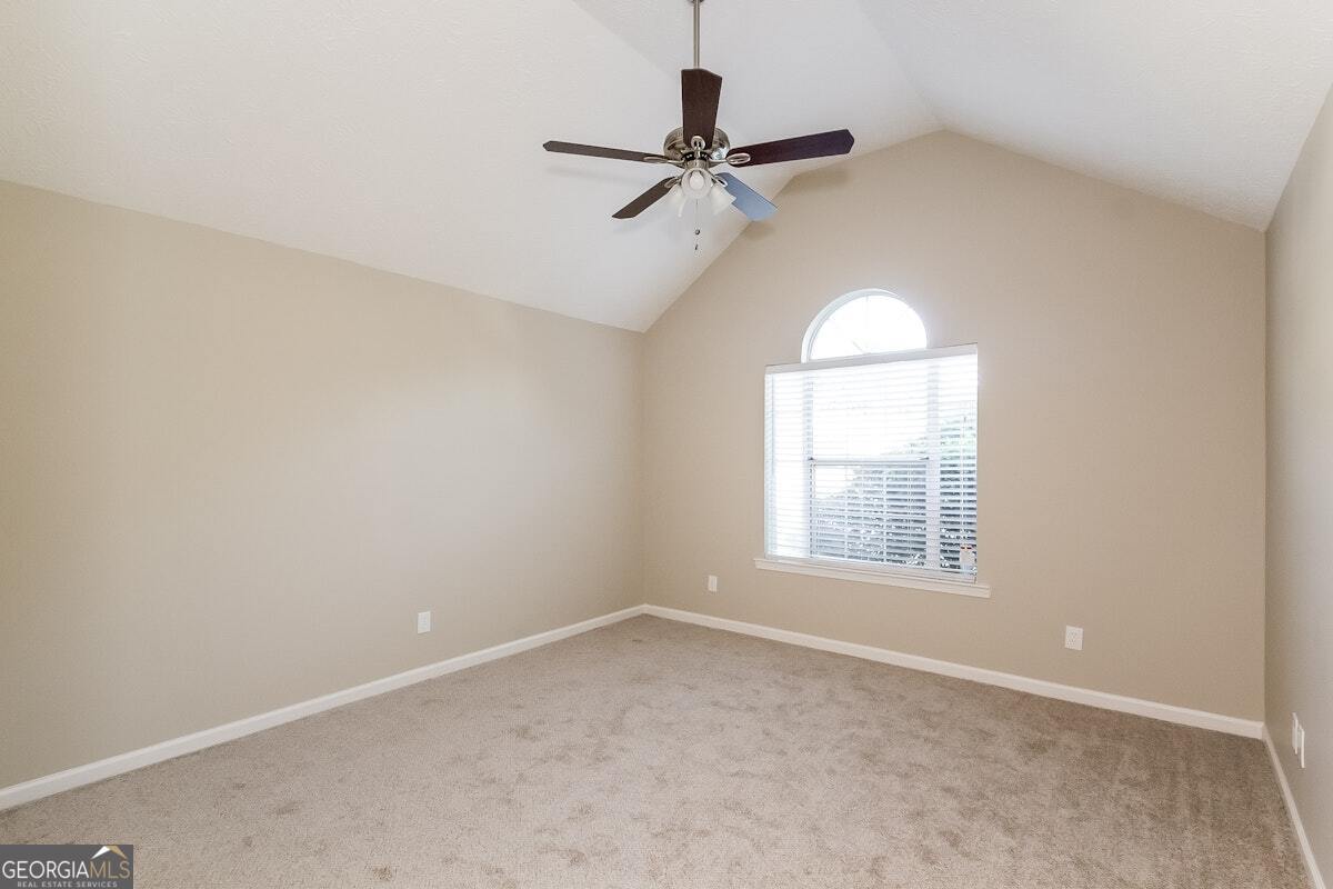 1136 Oakwood Manor Court Decatur, GA 30032 - Photo 11 of 15 an empty room with a window