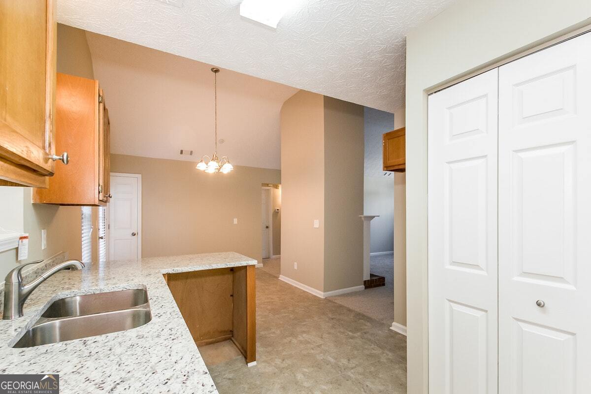 1136 Oakwood Manor Court Decatur, GA 30032 - Photo 6 of 15 a bathroom with a sink and a mirror