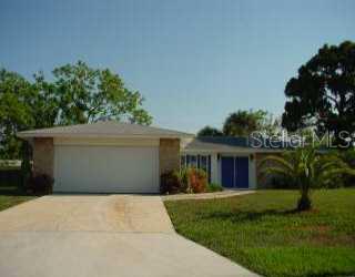 263 Redwood Road Venice, FL 34293 - Photo 1 of 1 a front view of house with yard and green space