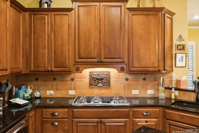 a large kitchen with stainless steel appliances
