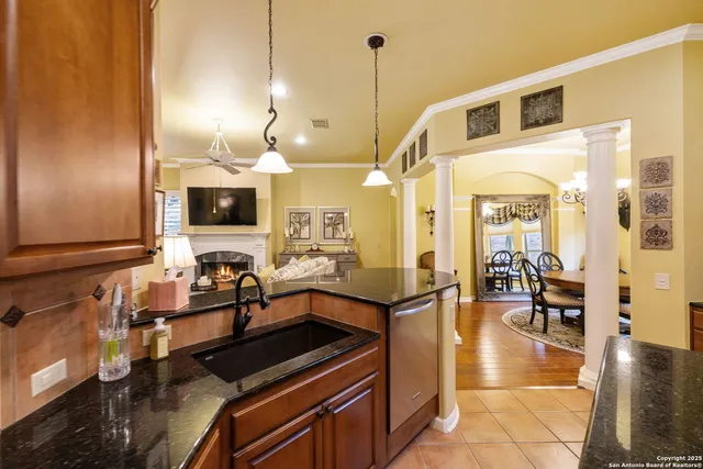 a spacious bathroom with a double vanity sink and a mirror