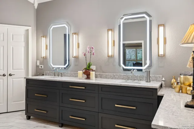 a view of a house with a tree in a yard