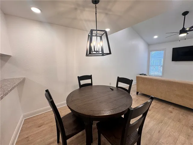a view of a dining room with furniture