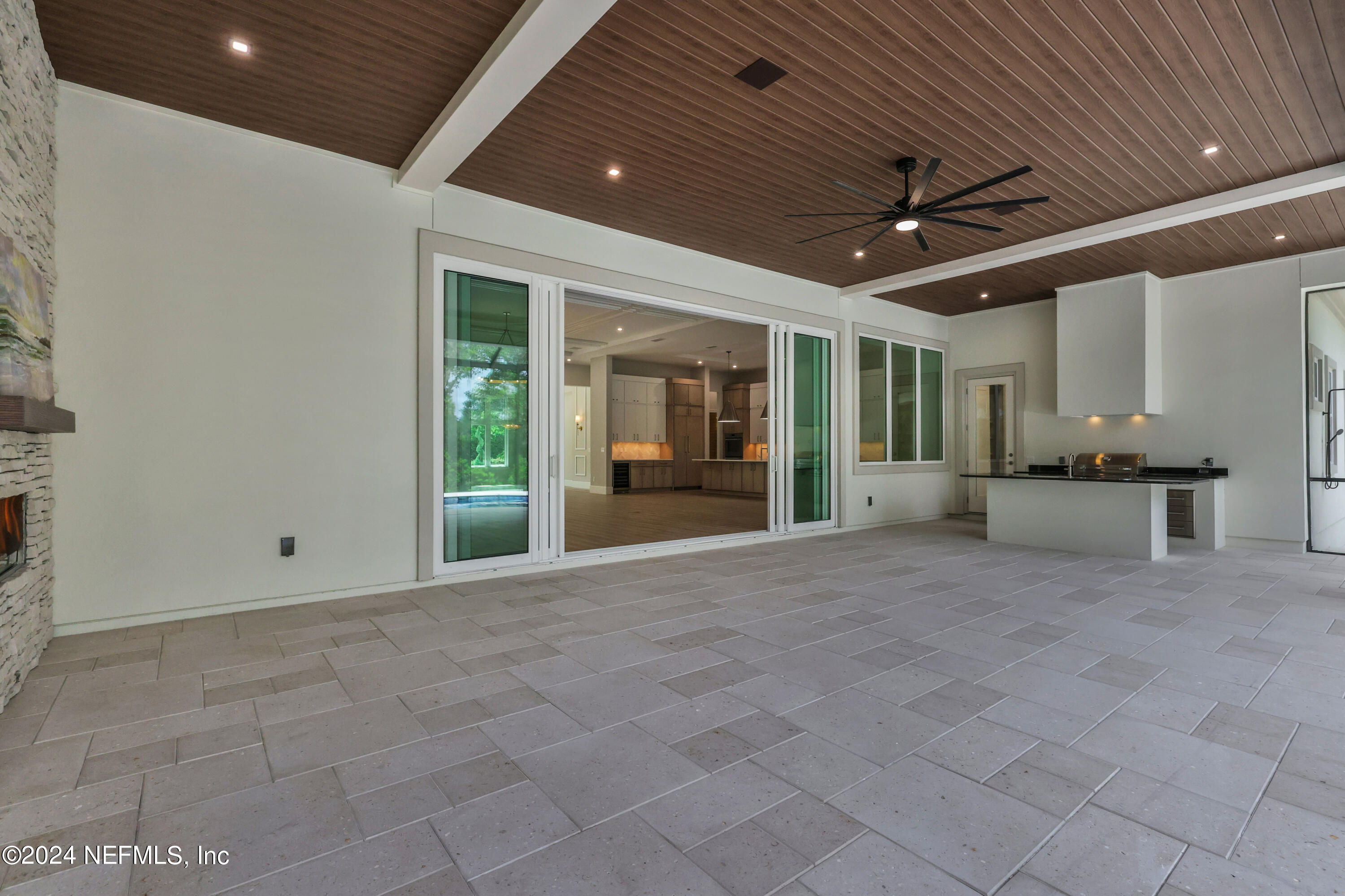 149 Marshall Creek Drive St. Augustine, FL 32095 - Photo 62 of 91 a view of an empty room with a kitchen
