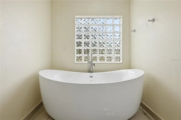 a close up of a bathtub in a bathroom