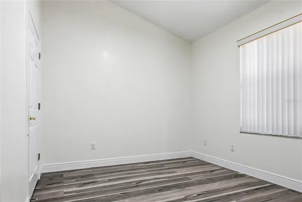 a view of a room that has a window