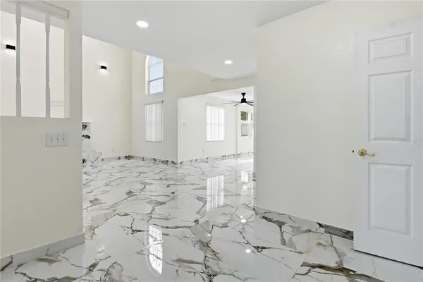 a bathroom with shower sink and mirror
