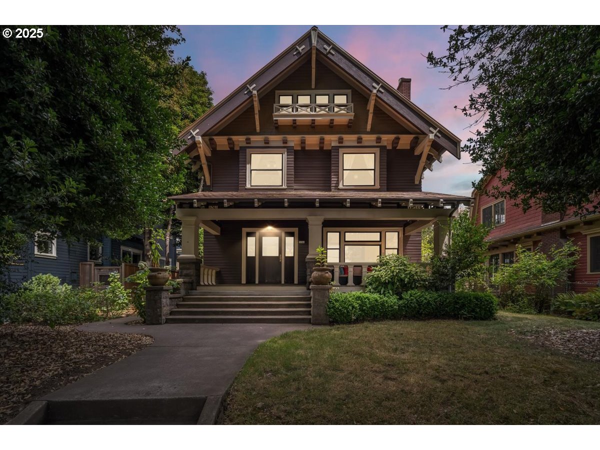 1844 Southeast 12th Avenue Portland, OR 97214 - Photo 1 of 48 a front view of a house with a yard