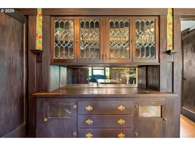 a workspace with furniture and a window