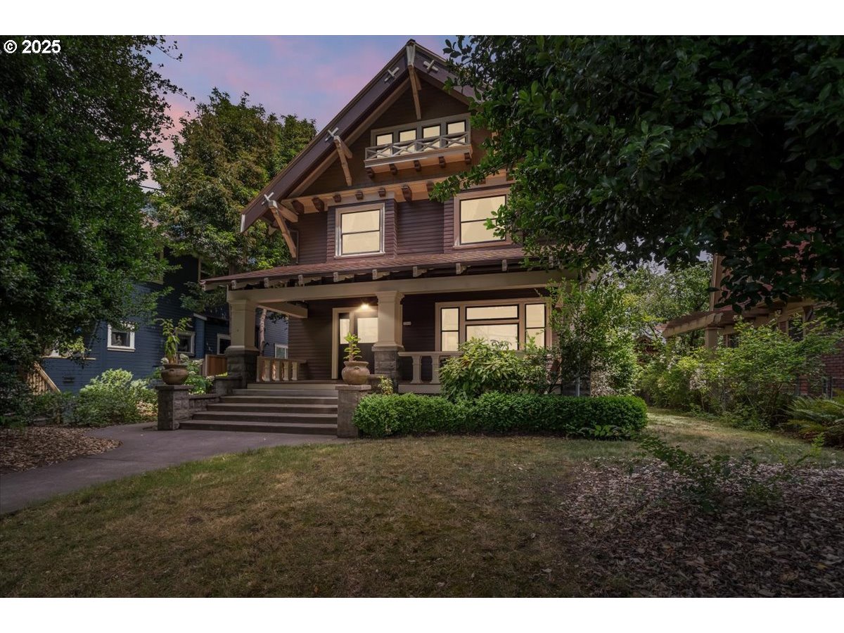 1844 Southeast 12th Avenue Portland, OR 97214 - Photo 2 of 48 a front view of a house with a yard