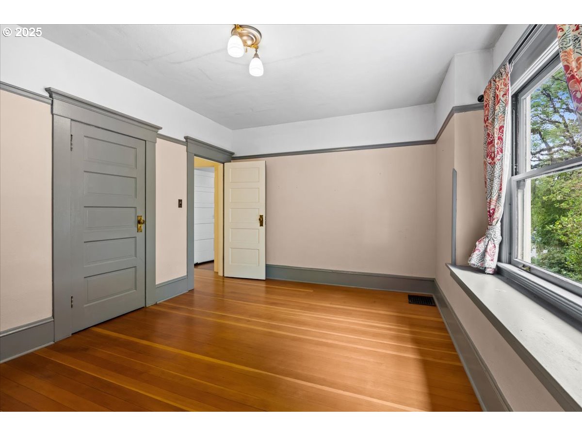 1844 Southeast 12th Avenue Portland, OR 97214 - Photo 23 of 48 a view of an empty room with a window