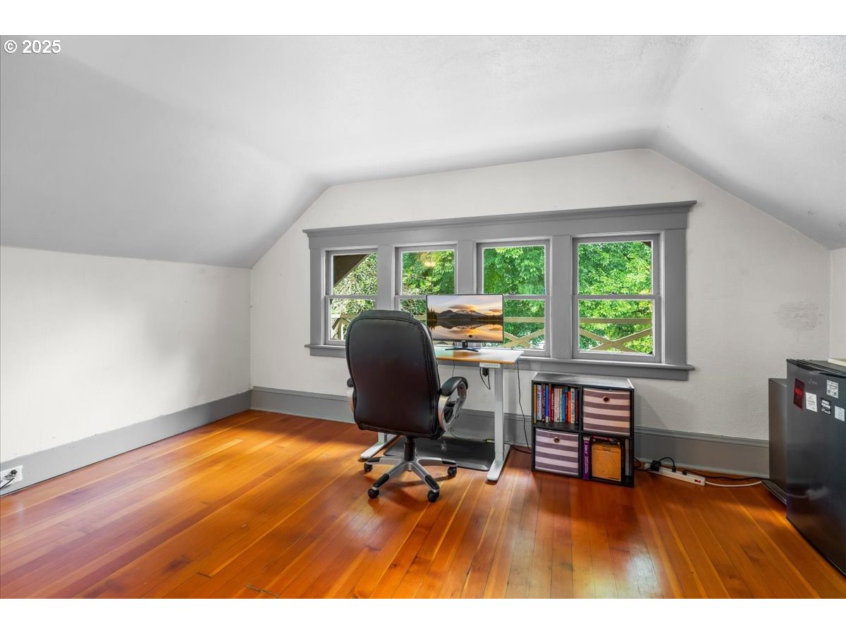 1844 Southeast 12th Avenue Portland, OR 97214 - Photo 29 of 48 a workspace with furniture and a window