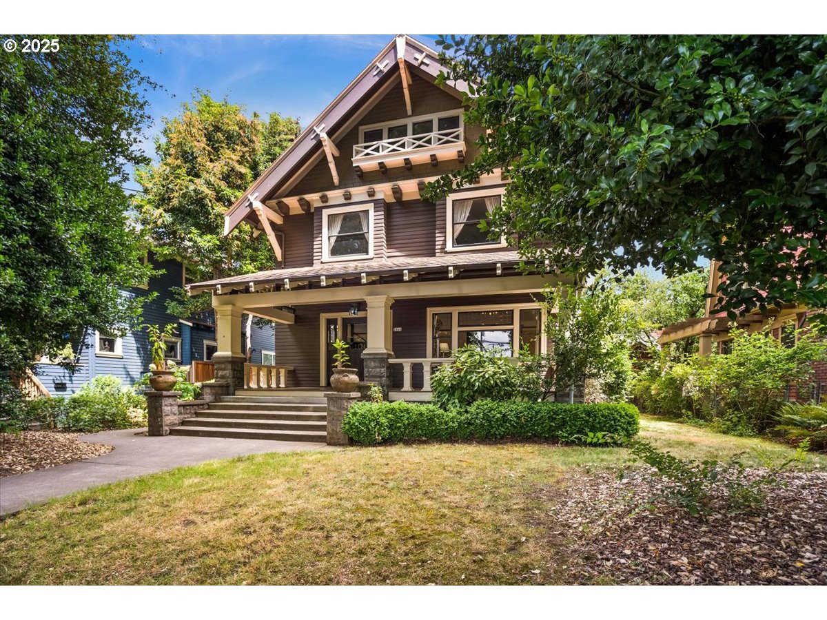 1844 Southeast 12th Avenue Portland, OR 97214 - Photo 3 of 48 a view of a house with a yard