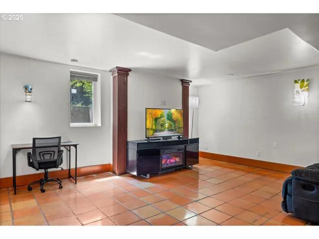 a kitchen with stainless steel appliances kitchen island granite countertop a sink and cabinets