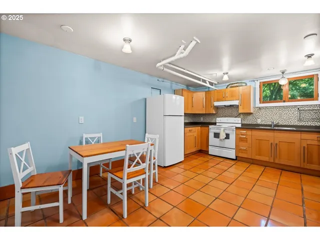 a room with a sink and a cabinets