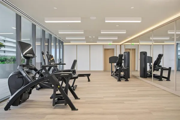 a view of kitchen with furniture and wooden floor
