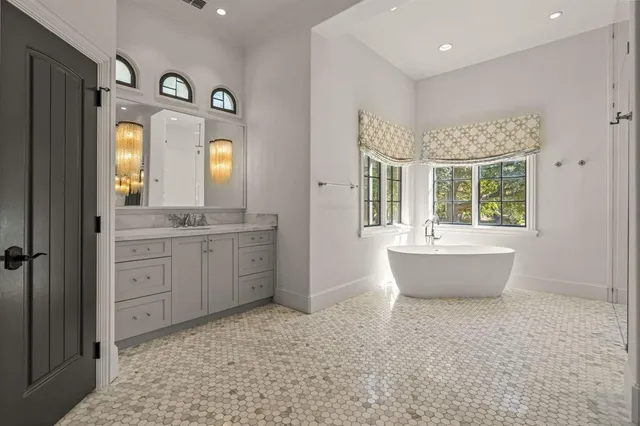 an aerial view of a house with garden space and street view