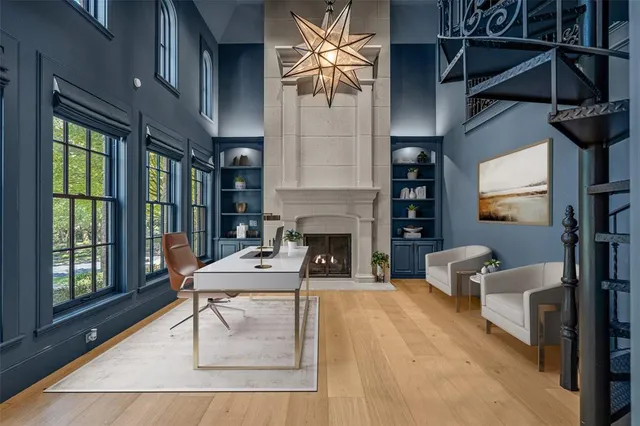 a view of a dining room with furniture and window