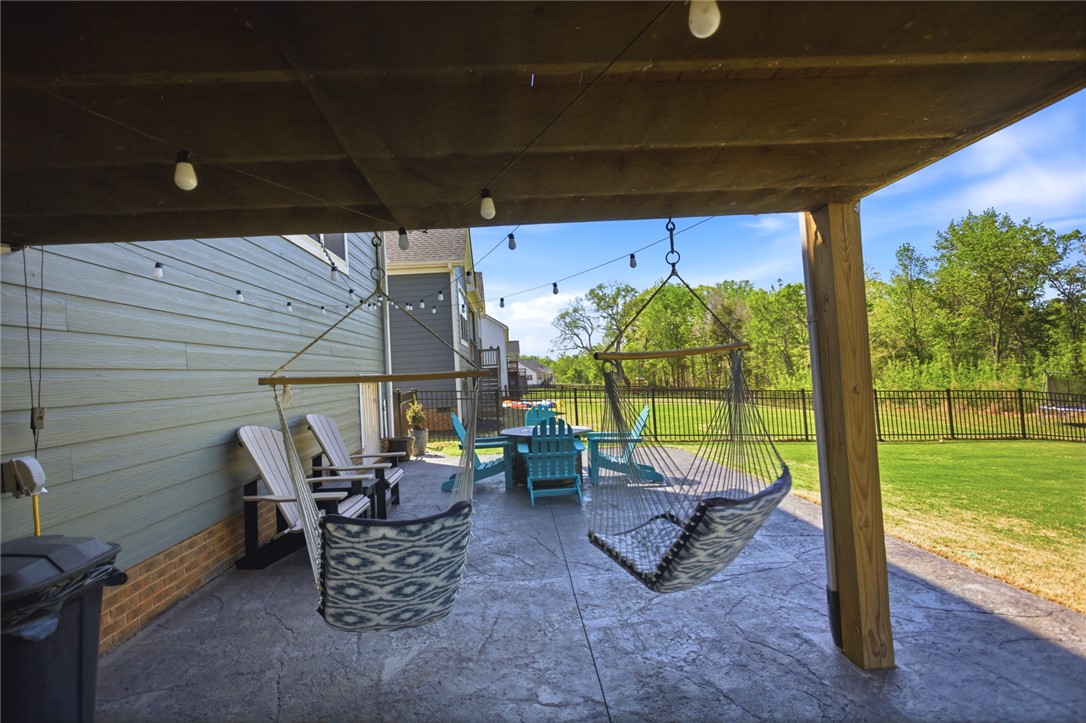 318 Summerall Drive Anderson, SC 29621 - Photo 34 of 42 This inviting covered patio offers a comfortable outdoor retreat with scenic green space views.