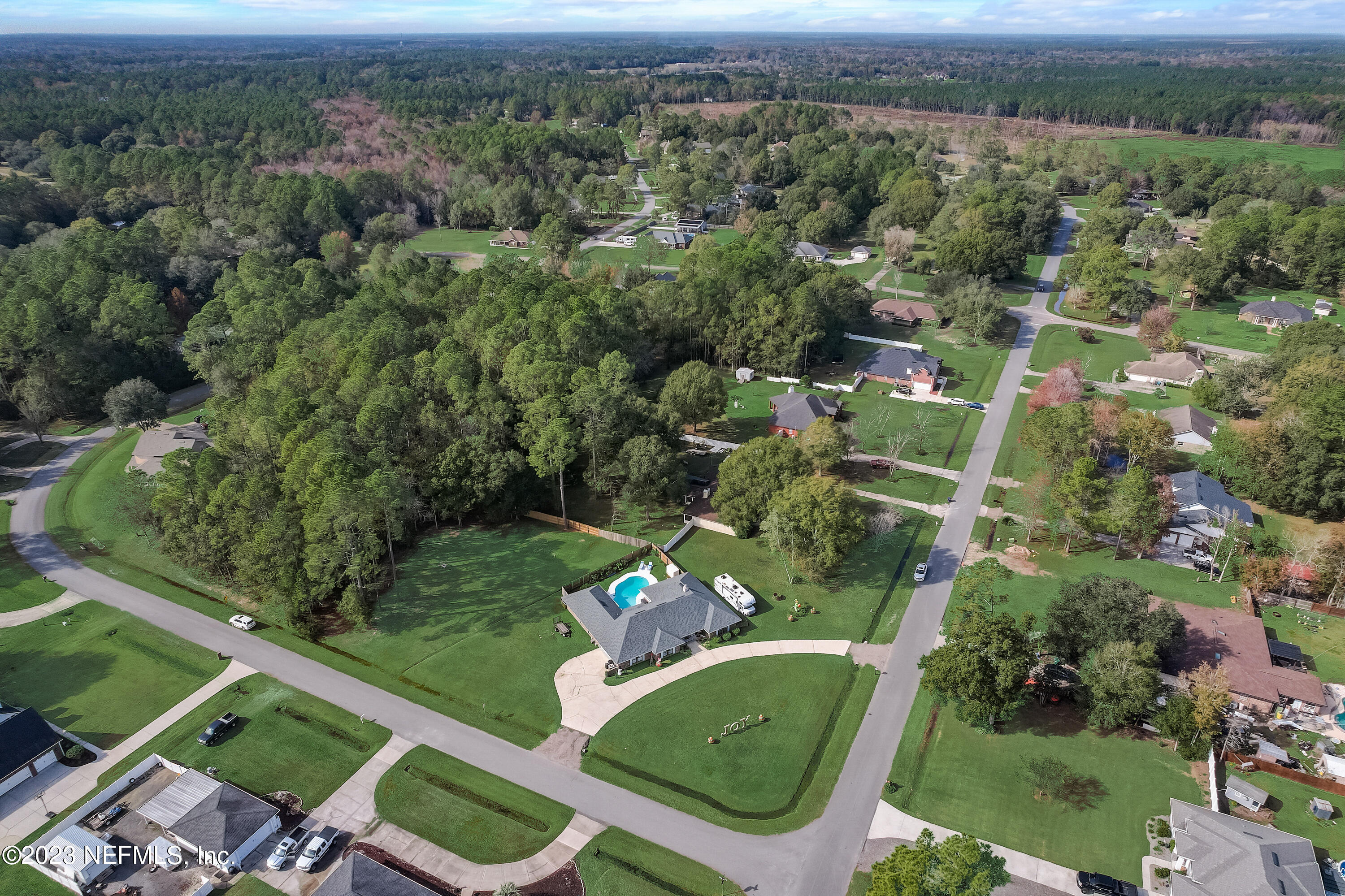 55377 Deer Run Road Callahan, FL 32011 - Photo 46 of 47 an aerial view of a house with a yard