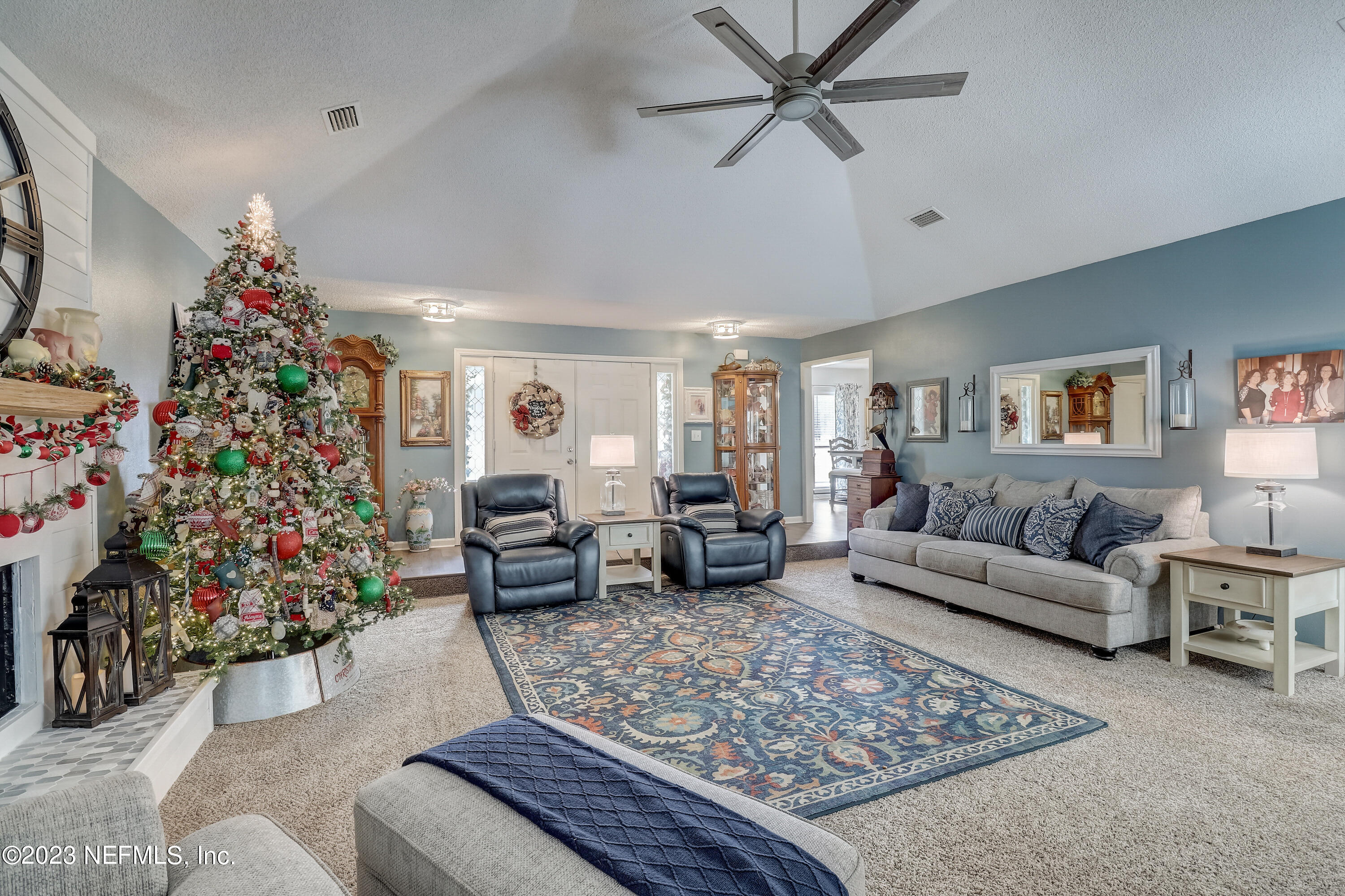55377 Deer Run Road Callahan, FL 32011 - Photo 6 of 47 a living room with furniture and a christmas tree