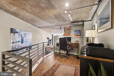 a view of a workspace with furniture