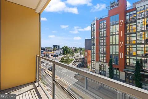 a view of a balcony with city view