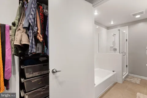 a bathroom with a sink vanity and a mirror
