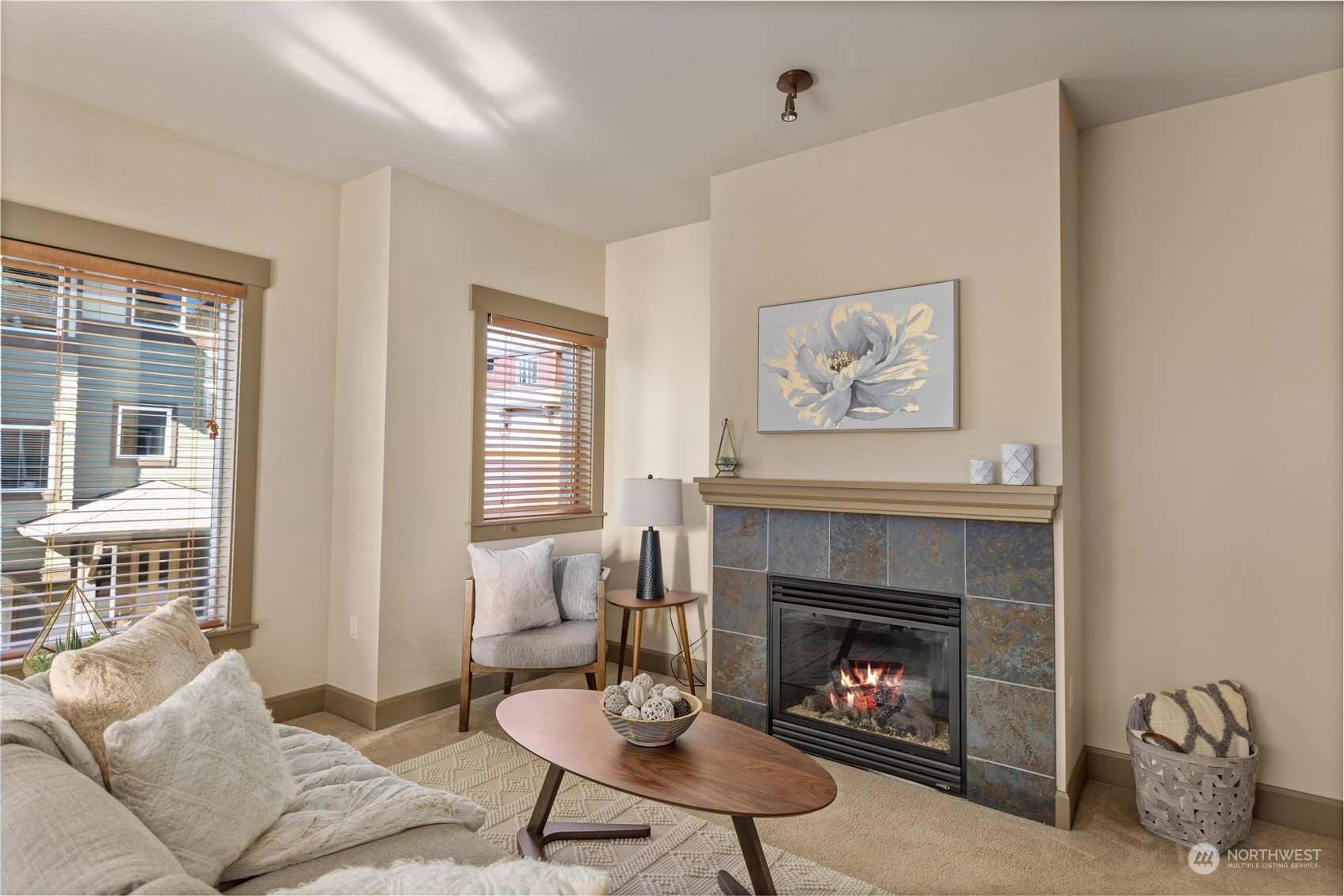 2115 201st Place Southeast, Unit I5 Bothell, WA 98012 - Photo 8 of 40 a living room with furniture and a fireplace