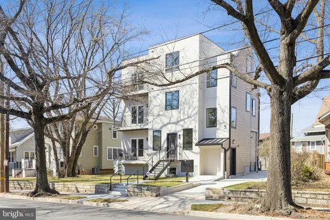 a front view of a building with street view