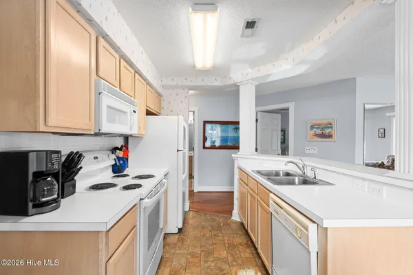 $235,000 | 908 Resort Circle, Unit 212, Sunset Beach, NC 28468