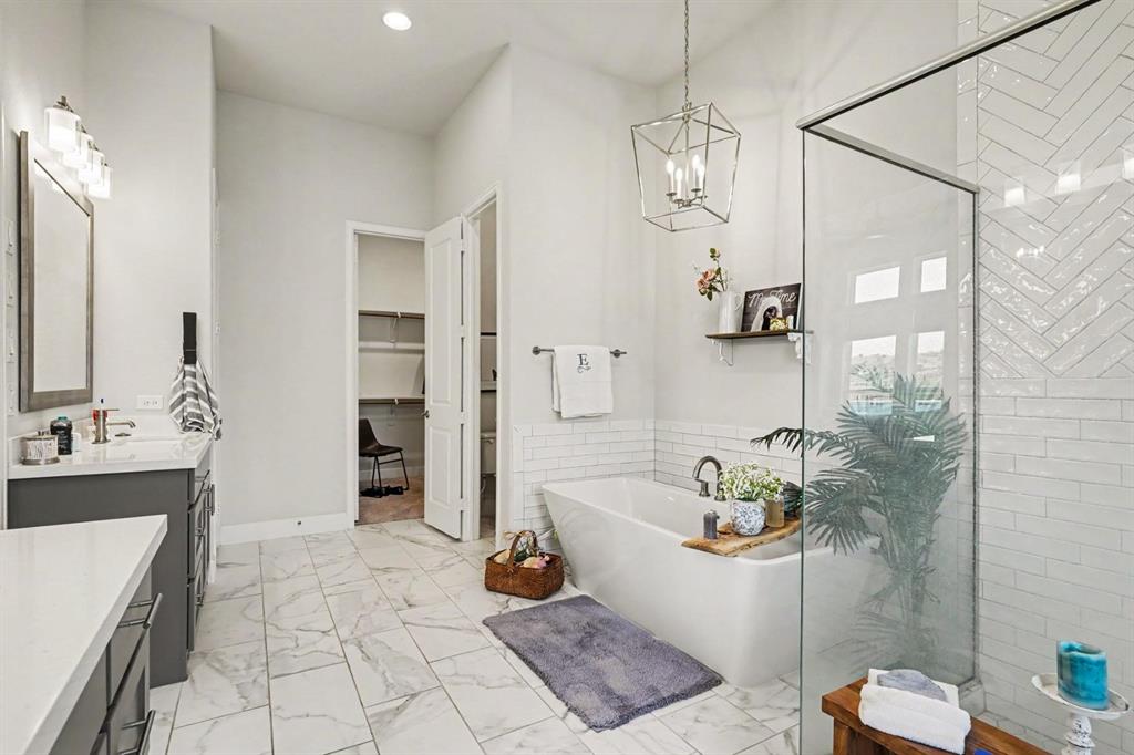 573 Broadleaf Way Haslet, TX 76052 - Photo 26 of 35 a bathroom with a sink a toilet and shower