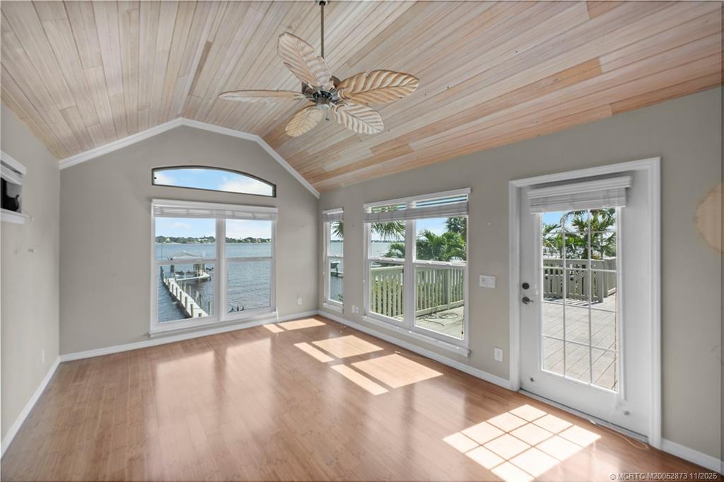 969 Southeast St Lucie Boulevard Stuart, FL 34996 - Photo 13 of 49 a view of an entryway with wooden floor