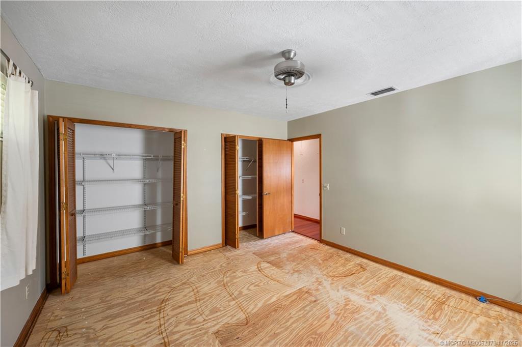 969 Southeast St Lucie Boulevard Stuart, FL 34996 - Photo 23 of 49 a view of an empty room with a closet