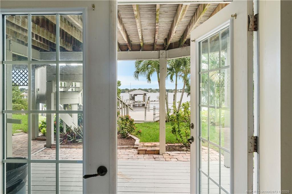 969 Southeast St Lucie Boulevard Stuart, FL 34996 - Photo 34 of 49 a view of a glass door with a glass door