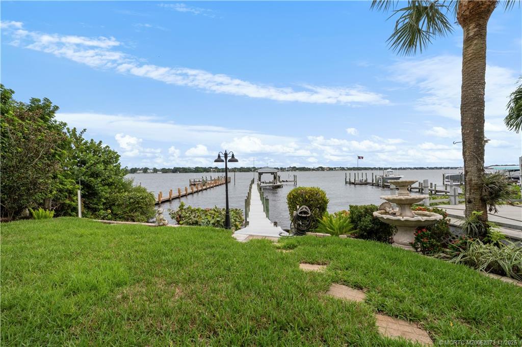 969 Southeast St Lucie Boulevard Stuart, FL 34996 - Photo 37 of 49 a view of a garden with sitting area