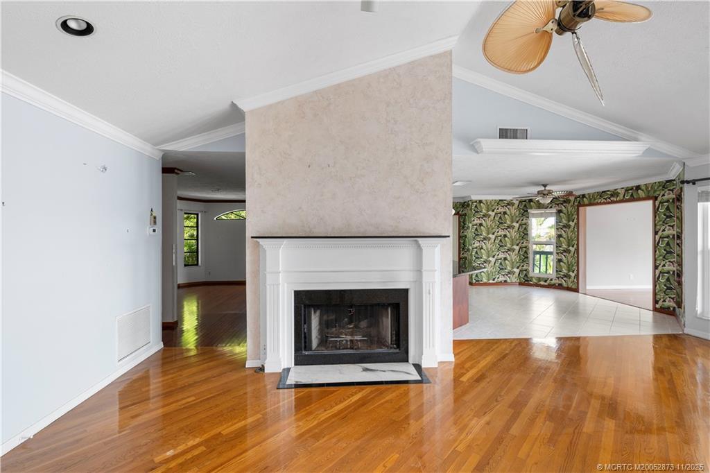 969 Southeast St Lucie Boulevard Stuart, FL 34996 - Photo 10 of 49 a living room with a fireplace