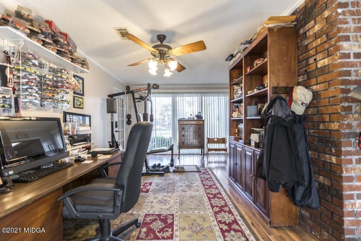 1471 Woolfolk Road Fort Valley, GA 31030 - Photo 16 of 51 a view of a workspace with furniture
