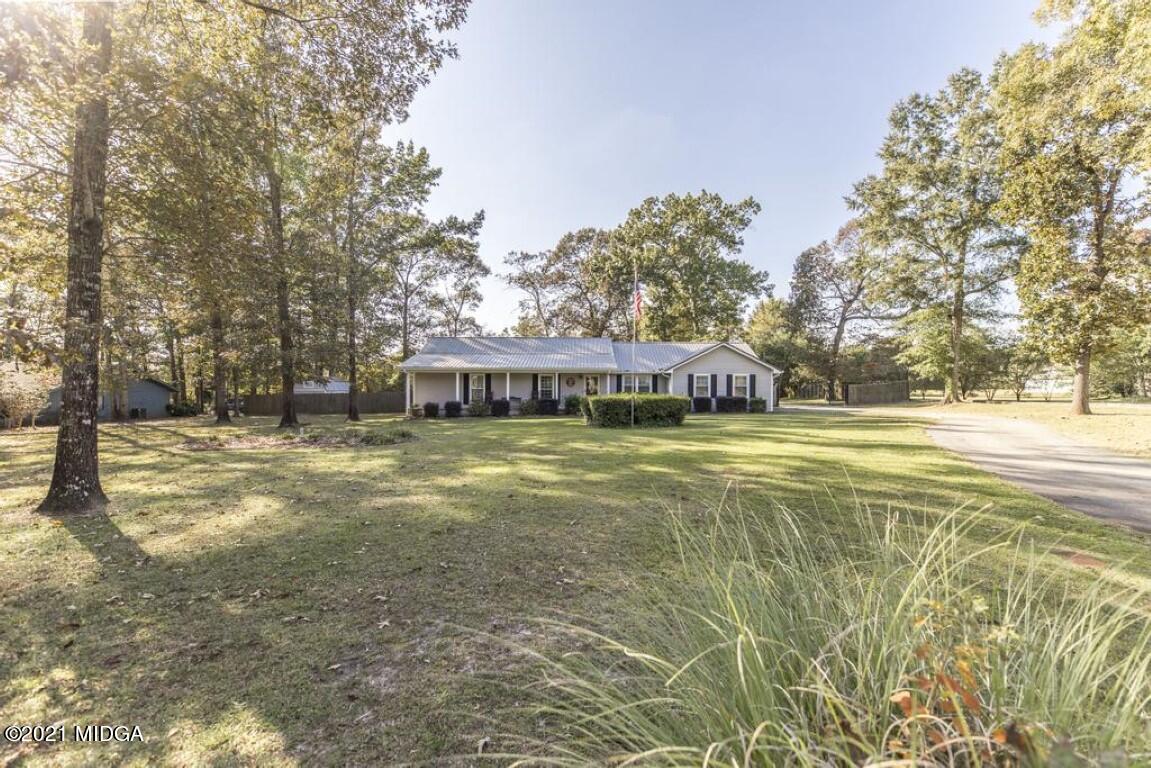 1471 Woolfolk Road Fort Valley, GA 31030 - Photo 3 of 51 a view of a house with a yard